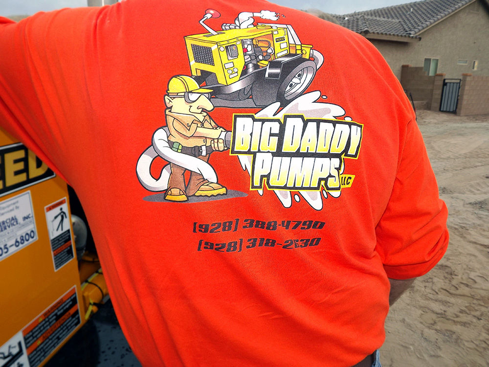 Big Daddy Pumps logo on the back of a company shirt.